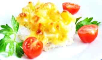 Курица под шапкой из ананасами и сыра